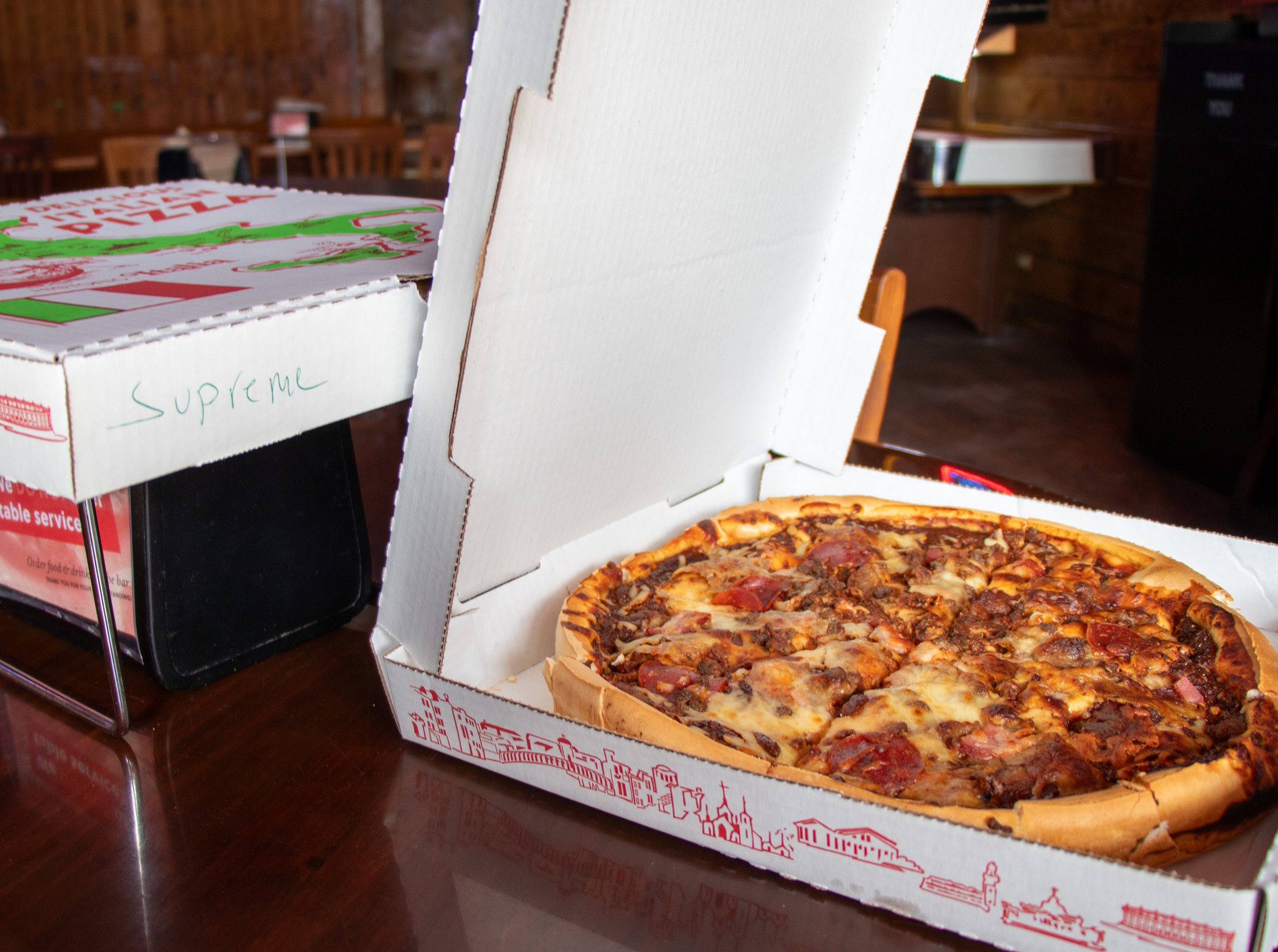 Blackthorn pizza in an open box